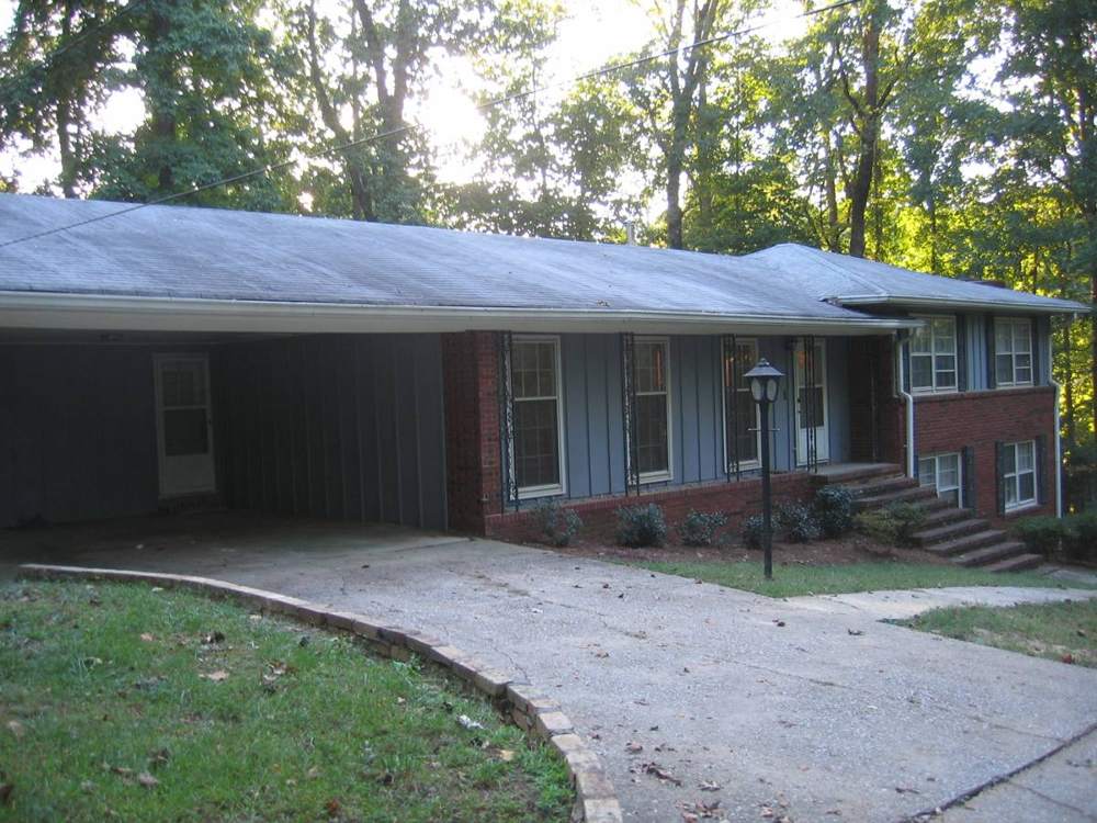 Brick Carport House: Front, other angle