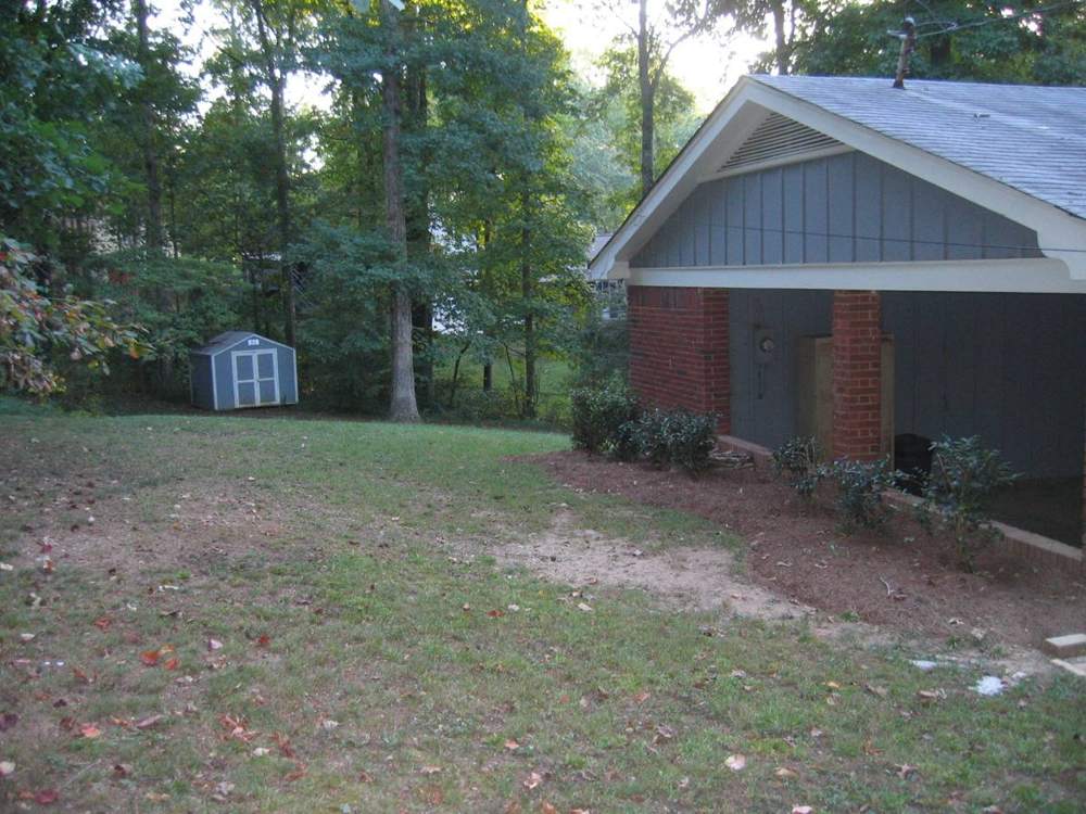 Brick Carport House: Backyard